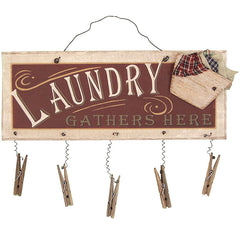 laundry gathers here clothespin sign