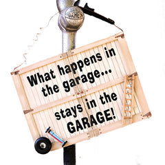 what happens in the garage sign