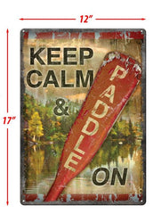 keep calm and paddle on tin sign