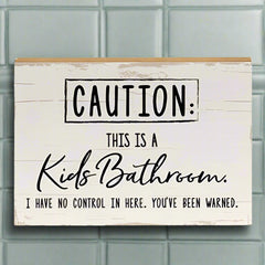 caution this is a kids bathroom sign