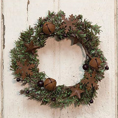 pine cones stars jingle bells and snowflakes candle wreath