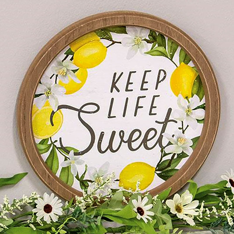 keep life sweet round framed lemon sign