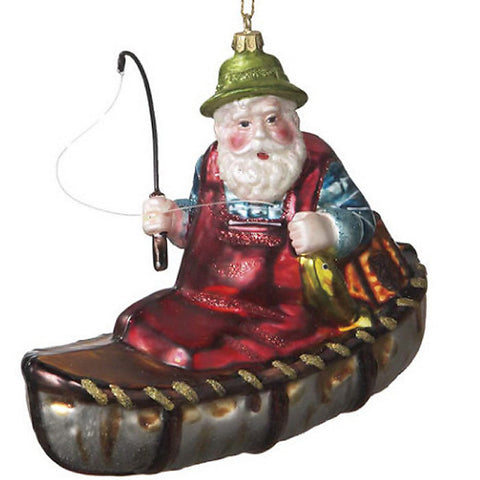 Blown Glass Santa In Canoe Christmas Ornament