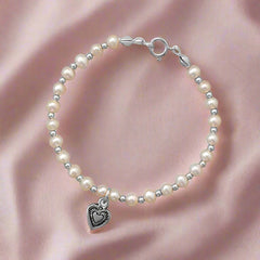 cultured freshwater pearl and silver beaded heart bracelet