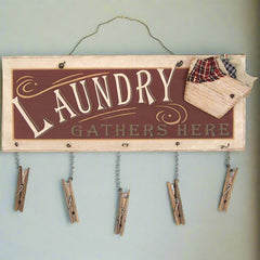 laundry gathers here clothespin sign