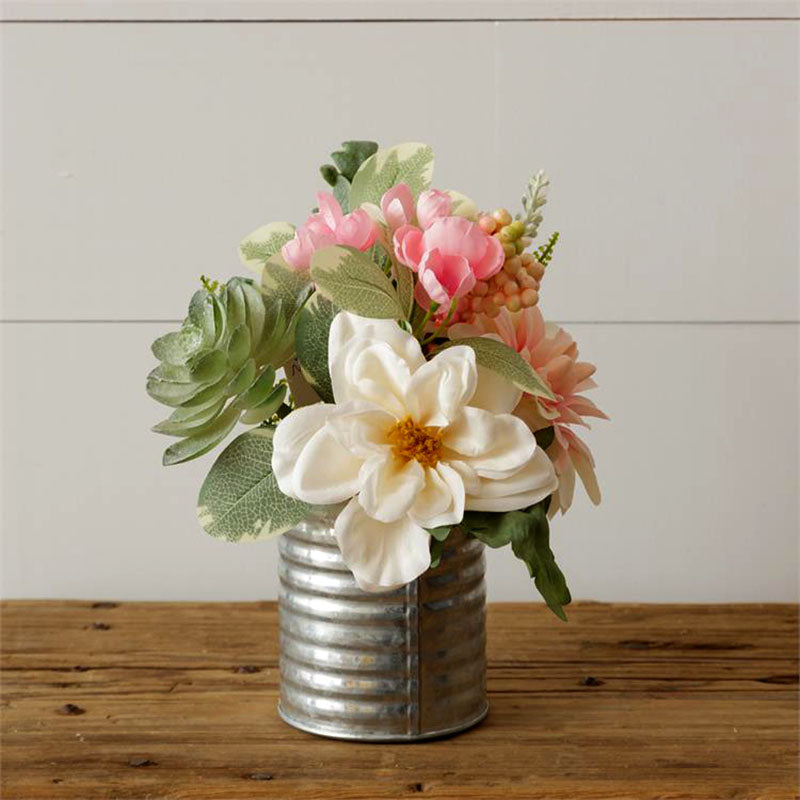 pink and white bouquet in tin vase