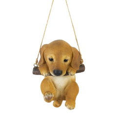 swinging puppy figurine